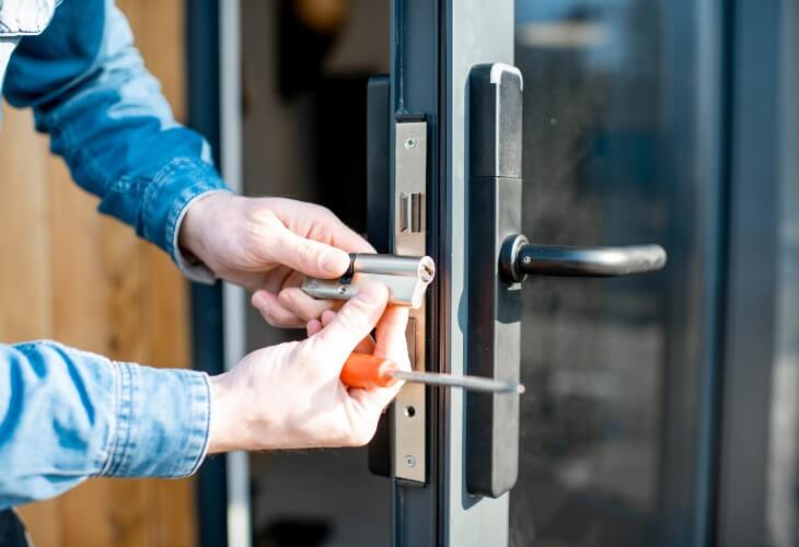 Locksmith in Bristol changing a lock